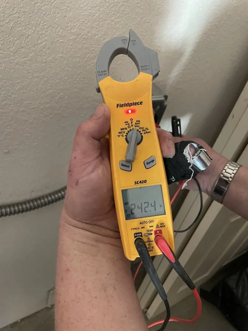 Voltage testing with clamp meter during Electrical Installation Services in Melbourne